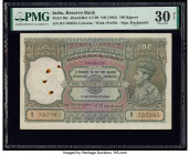 India Reserve Bank of India 100 Rupees ND (1943) Pick 20e Jhun4.7.2B PMG Very Fine 30 Net. Rust damage, spindle holes and ink stamp have been noted on...