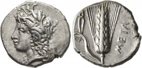 LUCANIA. Metapontion. Circa 330-290 BC. Didrachm or Nomos (Silver, 22 mm, 7.79 g, 4 h). Head of Demeter to left, wearing wreath of grain ears, triple ...
