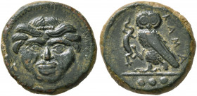 SICILY. Kamarina. Circa 420-405 BC. Tetras (Bronze, 14 mm, 2.58 g, 3 h). Facing gorgoneion with protruding tongue. Rev. KAMA Owl standing left, head f...