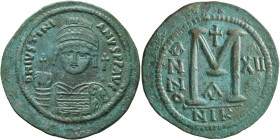 Justinian I, 527-565. Follis (Bronze, 43 mm, 22.64 g, 7 h), Constantinopolis, RY 12 = 538/9. D N IVSTINIANVS P P AVI Helmeted and cuirassed bust of Ju...