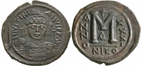 Justinian I, 527-565. Follis (Bronze, 35 mm, 17.65 g, 6 h), Nicomedia, RY 31 = 557/8. D N IVSTINIANVS P P AVI Helmeted and cuirassed bust of Justinian...