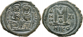 Justin II, with Sophia, 565-578. Follis (Silver, 29 mm, 13.44 g, 6 h), Nicomedia, RY 11 = 575/6. D N IVSTINVS P P AVG Justin II, holding globus crucig...