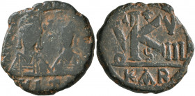 Justin II, with Sophia, 565-578. Half Follis (Bronze, 23 mm, 6.73 g, 1 h), Carthage, RY 8 = 572/3. Facing busts of Justin II, on the left, helmeted an...