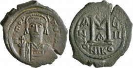 Maurice Tiberius, 582-602. Follis (Bronze, 31 mm, 11.71 g, 7 h), Nicomedia, RY 7 = AD 588/9. D N mAV TIbЄ P P Helmeted and cuirassed bust of Maurice T...