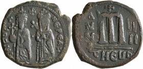 Phocas, 602-610. Follis (Bronze, 27 mm, 10.00 g, 12 h), with Leontia, Theoupolis (Antiochia), RY 4 = 605/6. O N FOCA NЄ PЄ AV Phocas standing facing, ...