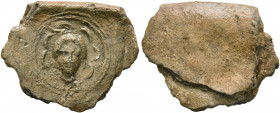 ROMAN. Circa 1st century. Seal (Lead, 21 mm, 4.21 g). Facing female head at the center of a floral design, all within two concentric circles. Apparent...