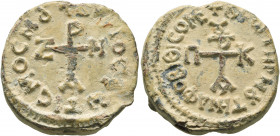 Uncertain patrikios, last quarter of 7th century. Seal (Lead, 26 mm, 24.12 g, 12 h). +KVPIOC ΦⲰΤΙCMOC MOV ("The Lord is my light") Cruciform monogram ...