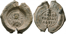 Aetios, 11th century. Seal (Lead, 24 mm, 14.68 g, 12 h). M/I-X/A Nimbate facing bust of St. Michael, holding scepter in his right hand and globe in hi...
