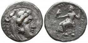 In the name of Alexander III ‘The Great’. AR . Uncertain Greek or Macedonian mint, circa 325-310 BC. Head of Herakles right, wearing lion skin headdre...