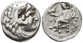 In the name of Alexander III ‘The Great’. AR . Uncertain Greek or Macedonian mint, circa 325-310 BC. Head of Herakles right, wearing lion skin headdre...