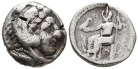 In the name of Alexander III ‘The Great’. AR . Uncertain mint (maybe Colophon), circa 325-310 BC. Head of Herakles right, wearing lion skin headdress ...