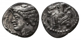 Cilicia, Uncertain mint AR Obol. 4th century BC. Head of Hermes wearing petasos left / Aphrodite seated left on throne decorated with sphinx.

Conditi...