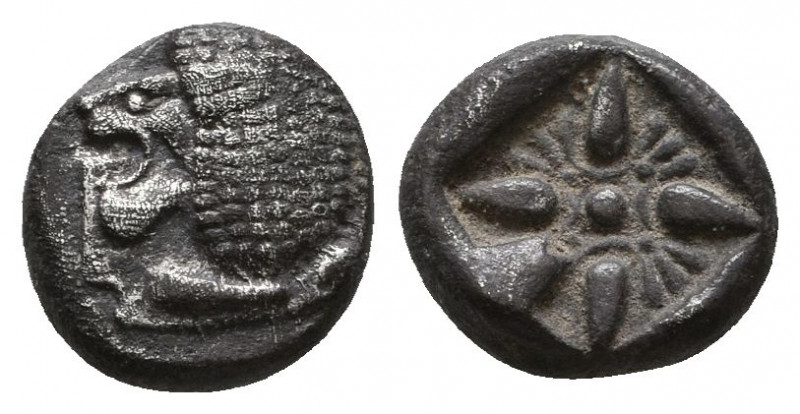 IONIA, Miletos. ca. 480-450 BC. AR Obol (1.16 gm). Forepart of lion / Incuse pun...