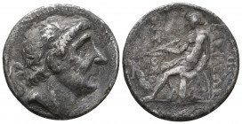 Seleukid Kings of Syria. Antiochos II Theos AR . Seleukeia on the Tigris, 261-246 BC. Diademed head of Antiochos I right / Apollo seated left on ompha...