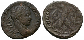 Caracalla AR Tetradrachm of Antioch, Syria. 215-217. Laureate head r. / Eagle standing facing, head and tail r., on thigh of sacrificial animal with w...