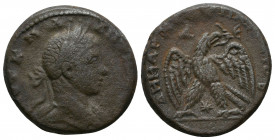 Caracalla AR Tetradrachm of Antioch, Syria. 215-217. Laureate head r. / Eagle standing facing, head and tail r., on thigh of sacrificial animal with w...