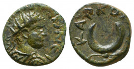 MESOPOTAMIA, Carrhae. Elagabalus. AD 218-222. Æ . Radiate head right / Crescent set on small filleted globe, rosette of seven pellets within crescent....