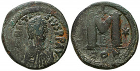 Anastasius I Æ Nummus. Constantinople, AD 498-507. D N ANASTASIVS P P AVG, pearl-diademed, draped and cuirassed bust right / Large M; cross above, sta...