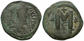 Justin I & Justinian I. 527. Æ Follis . Constantinople mint, 5th officina. Struck 4 April-1 August 527. Pearl-diademed, draped, and cuirassed bust of ...