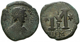 JUSTIN I. 518-527 AD. Æ Follis . Nicomedia mint, 2nd officina. Diademed, draped and cuirassed bust right / Large M, cross above; star left and right; ...