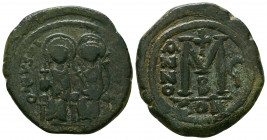 Justin II, with Sophia. 565-578. Æ Follis. Constantinople mint, 2nd officina. Dated RY 4 (568/9). Nimbate figures of Justin and Sophia seated facing o...