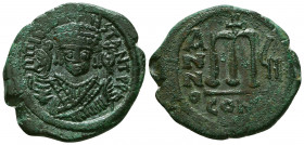 Tiberius II Constantine. 578-582. Æ follis . Constantinople mint, dated RY 6 = 579/80. d m TIb CONSTANT P P AVG, crowned facing bust, wearing consular...