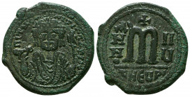 Maurice Tiberius. 582-602. AE follis. Antioch/Theopolis,
bust of Maurice Tiberius facing, wearing crown with trefoil ornament and consular robes, hold...
