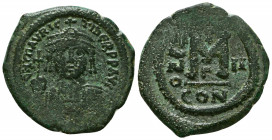 Maurice Tiberius (582-602), Follis,Constantinople, AD 586-587 AE. D N MAVRIC TIBER[PP AV], bust facing helmeted and cuirassed, holding cruciger globe ...