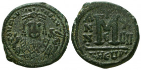 Maurice Tiberius. 582-602. Æ Follis . Theopolis (Antioch) mint, 3rd officina. Dated RY 17 (598/9). Crowned bust facing, wearing consular robes, holdin...