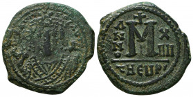 Maurice Tiberius. 582-602. Æ Follis. Theopolis (Antioch) mint, 3rd officina. Dated RY 17 (598/9). Crowned bust facing, wearing consular robes, holding...