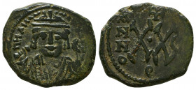 Maurice Tiberius, 582 - 602 AD
AE Half Follis, Constantinople Mint,
Obverse: Crowned and robed bust of Maurice facing holding mappa and eagle tipped s...