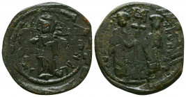 Constantine X Ducas. 1059-1067. AE follis. Constantinople mint. +EMMA NOVHA, IC-XC, Christ standing facing on footstool, wearing nimbus and holding Bo...