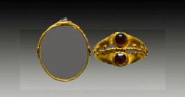 Very Elegant Ancient Roman Gold Ring with 2 red stone on bezel
Reference:
Condition: Very Fine

Weight: 1,9 gr
Diameter: 16 mm
