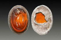 Ancient Roman Carnelian Silver Ring Bezel with a Deity on it
Reference:
Condition: Very Fine

Weight: 0,5 gr
Diameter: 9,5 mm