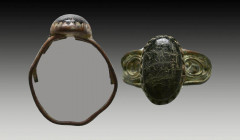 Ancient Bronze Fligree Ring with a black on bezel
Reference:
Condition: Very Fine

Weight: 1,5 gr
Diameter: 22 mm