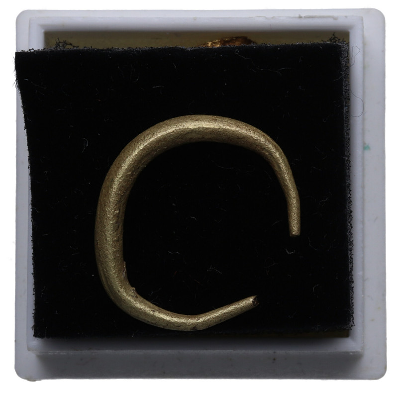 s. II-I aC. Noroeste. Premoneda en forma de torques (21 mm). Au. RARA. Bella. EB...