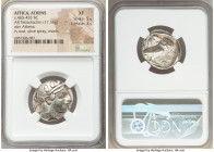 ATTICA. Athens. Ca. 465-455 BC. AR tetradrachm (24mm 17.16 gm, 7h). NGC XF 5/5 - 3/5. Head of Athena right, wearing crested Attic helmet ornamented wi...