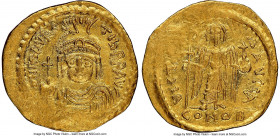 Maurice Tiberius (AD 582-602). AV solidus (21mm, 7h). NGC AU, clipped. Constantinople, 1st officina. o N mAVRC-TIb PP AVG, draped and cuirassed bust o...