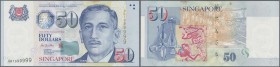 Singapore: 50 Dollars ND(1999), P.41 with fancy serial number 0BT999999 in excellent condition without any fold, but a few brownish spots at upper mar...