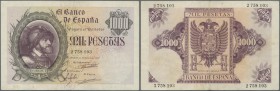 Spain: 1000 Pesetas 1940, P.125, very popular note in nice condition with vertical fold at center, lightly toned paper and tiny pinholes at upper righ...