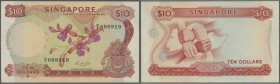 Singapore: 10 Dollars ND(1967-73) P. 3, light center bend, light stain at upper right, corner tips at upper and lower left a bit stained, crisp paper,...
