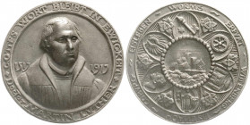 Medaillen
Reformation
Deutschland
Eisengussmedaille 1917 a.d. 400 Jf. der Reformation. Brb. Luther fast v.v./Burg inmitten von 6 Wappen. 70 mm. seh...