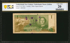 NETHERLANDS NEW GUINEA. Nederlands Nieuw-Guinea. 1 Gulden, 1954. P-11a. PCGS Banknote Very Fine 20 Details. Ink Marks, Minor Adhesive Residue.

An oft...