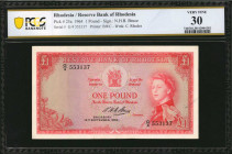 RHODESIA. Reserve Bank of Rhodesia. 1 Pound, 1964. P-25a. PCGS Banknote Very Fine 30.

Printed by BWC. Watermark of C. Rhodes. Printed signature of N....