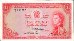RHODESIA. Reserve Bank of Rhodesia. 1 Pound, 1964. P-25. Very Fine.

Mounting remnants are noticed on this 1 Pound Rhodesian note. The paper remains m...