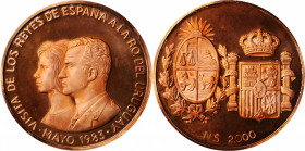 URUGUAY. 2000 Nuevos Pesos, 1983. Grade: PROOFLIKE UNCIRCULATED.

Diameter: 50.5mm. Conjoined busts obverse, commemorating the visit of the King of Sp...