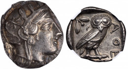 ATTICA. Athens. AR Tetradrachm (17.15 gms), ca. 454-404 B.C. NGC AU, Strike: 5/5 Surface: 5/5.

HGC-4, 1597; Kroll-8. Obverse: Helmeted head of Athena...