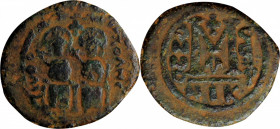 ARAB-BYZANTINE. Umayyad Caliphate. AH 41-77 (A.D. 661-697). AE Fals (12.68 gms), Baysan (Nysa-Scythopolis) Mint. CHOICE FINE.

Album-3509.1. Imitating...