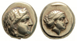 Greek
LESBOS, Mytilene. (Circa 377-326 BC). 
Hekte Electrum (10mm 2.54g)
Laureate head of Apollo right; [small serpent behind neck] / Head of Artemis ...