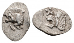 Greek
Mysia. Kyzikos. (Circa 450-400 BC)
Hemiobol Silver (10.6mm 0.43g)
Forepart of boar left; to right, tunny upward. / Head of roaring lion left; st...